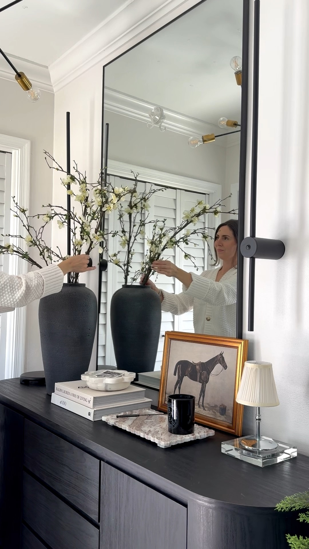 Let’s decorate my foyer console ✨🖤 adding some afloral cherry blossoms to make the space feel more tied together. These are some of my favorite stems, I use them every year 🤍

#LTKHome #LTKSaleAlert #LTKFindsUnder100
