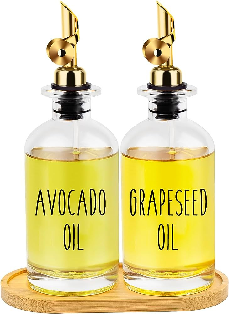 Aeakey Oil and Vinegar Dispensers with Metal Pour Spouts, Weighted Pourers, and Glass Bottles - P... | Amazon (US)