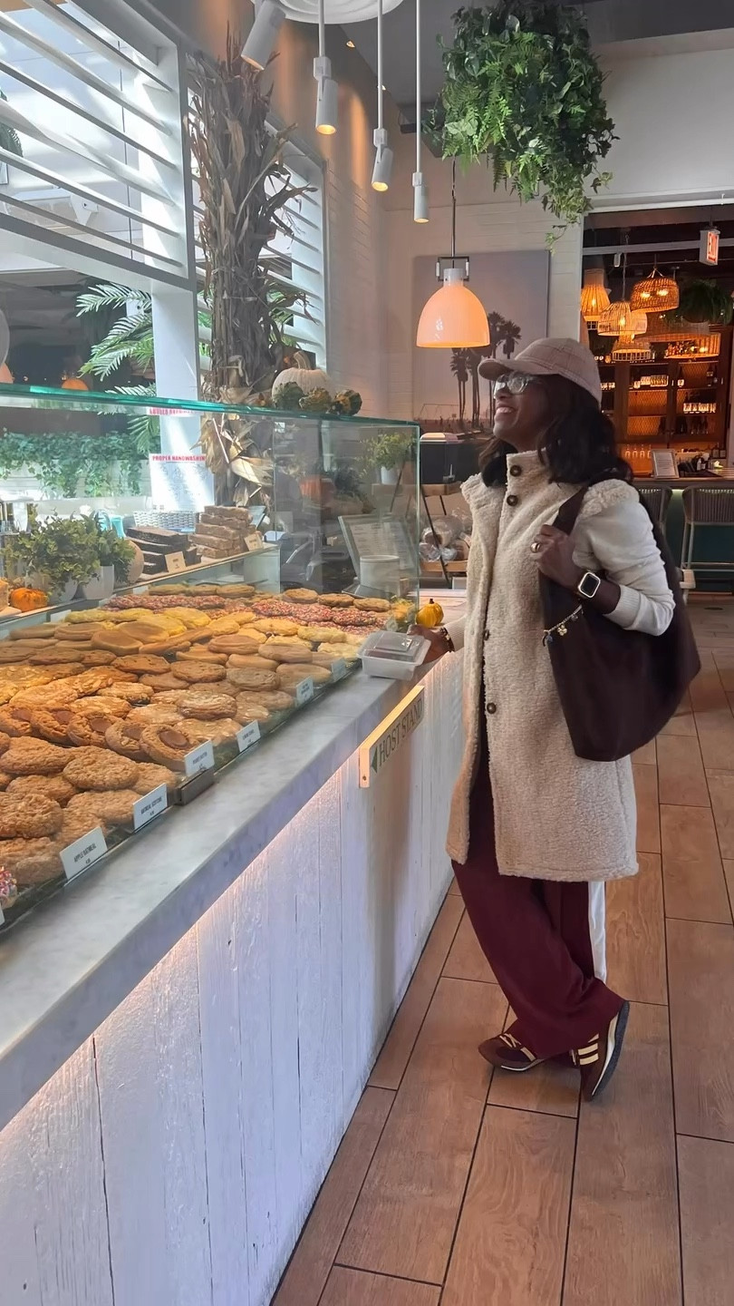 Drooling over cookies in my cozy vest! 

#LTKTravel #LTKStyleTip