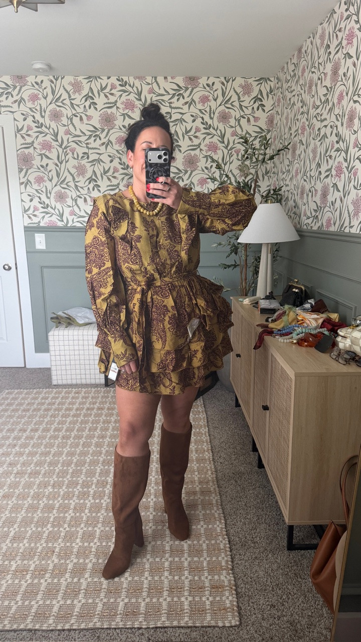 I love everything about this dress! The pattern, the tiered skirt, and how it truly is a statement! Looks amazing with tall boots too 🤎

#LTKNYFW #LTKgrwm #LTKdayinmylife