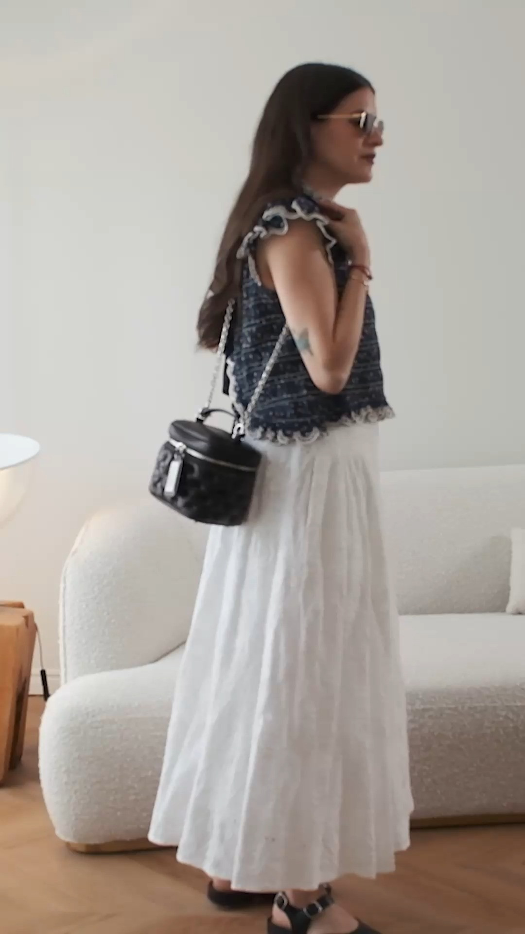 Sezane Liorane top styled with a white maxi skirt, Maison Margiela Vanity Bag, and Tabi ballet flats  

#LTKspring #LTKmodest #LTKsummer