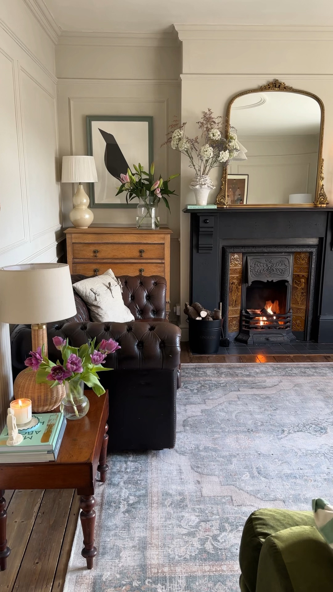 Living room decor 
Large gold over mantle mirror 
Washable rug
Chesterfield sofa 

#LTKhome #LTKeurope #LTKover40