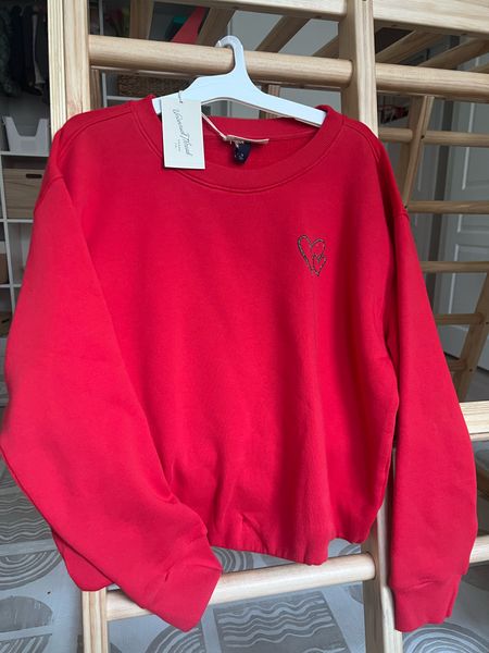 Cutest Valentine’s Cropped Sweatshirt. They call it bubble hemmed? Sized up for a bit of an oversized look. Available in red and gray. Hurry this one won’t last!!!

#LTKover40 #LTKfindsunder50 #LTKSeasonal