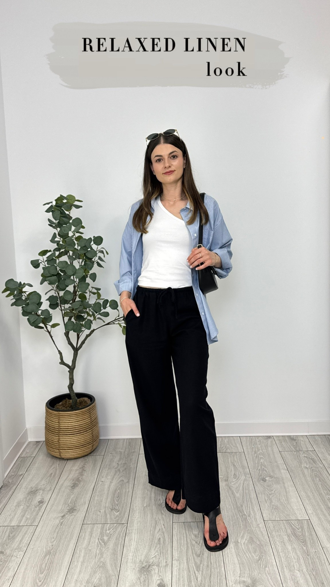 One-shoulder white top, black linen trousers, oversized blue striped shirt, black sandals, finished with a black purse and sunglasses—breezy and elevated 🩵 #IlaStylesDiary 

#LTKsummer #LTKstyletip #LTKbeauty