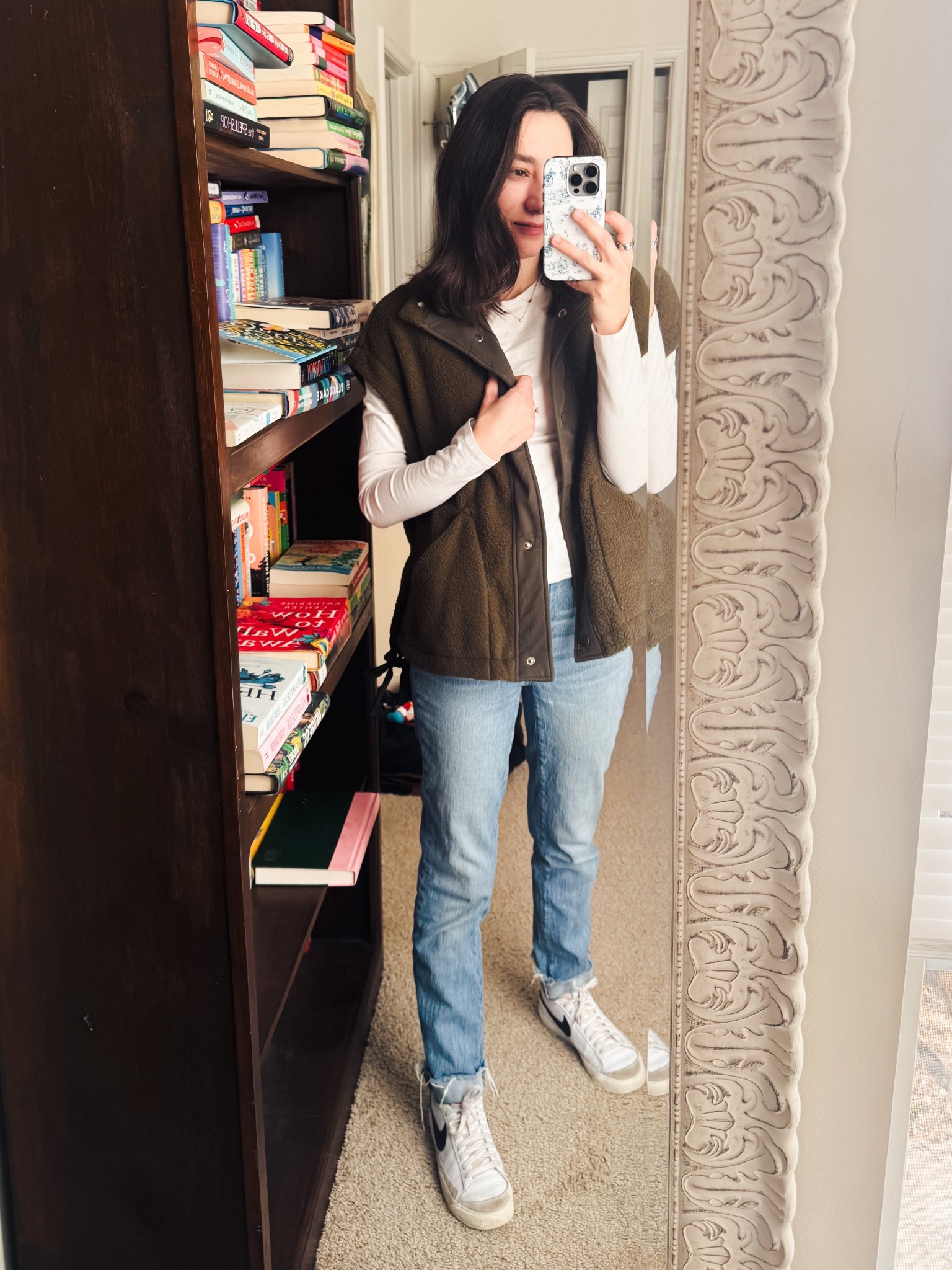 Momming outfit of the day to go to the library with a gap tee, madewell jeans, and a fleece vest  

#LTKmomlife #LTKootd