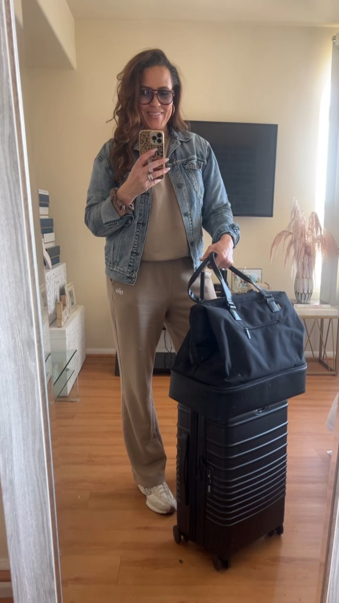 Travel outfit, Spring Break, vacation luggage, sweat set, denim jacket, neutral sneakers #LaidbackLuxeLife

Sweatshirt: S
Sweatpants: S (run big so I recommend sizing down 1 size)
Denim jacket: M (sized up for oversized look)
Sneakers: Run TTS

Hey Beautiful! Feel free to comment on this post if you have any questions! 🫶🏽

Follow me for more fashion finds, beauty faves, lifestyle, home decor, sales and more! So glad you’re here!! XO, Karma

#LTKWatchNow #LTKStyleTip #LTKFindsUnder100