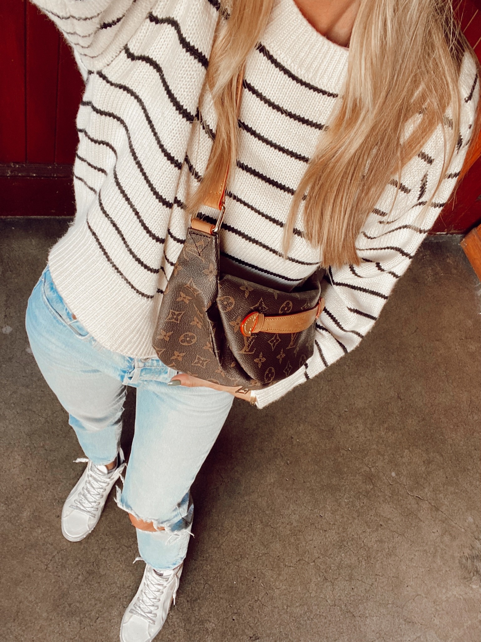 Striped sweater and Levi’s for a casual fall Disney ootd  

#LTKunder100 #LTKSeasonal #LTKunder50