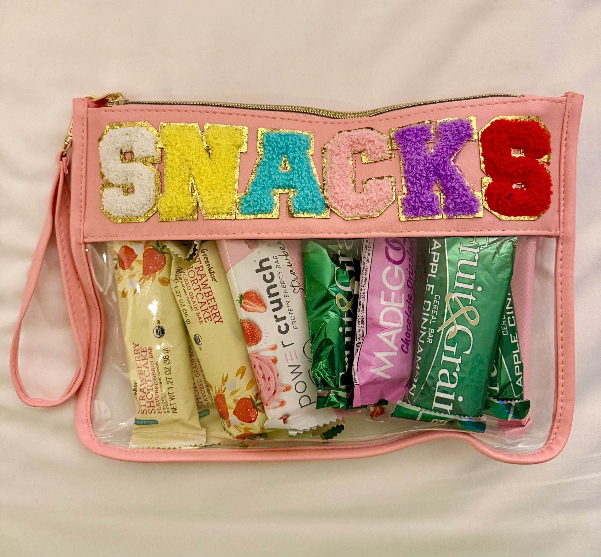 This snack bag is perfect for travel. It holds a lot of items and super cute with the colorful patch letters  

#LTKdayinmylife #LTKTravel #LTKfoodie