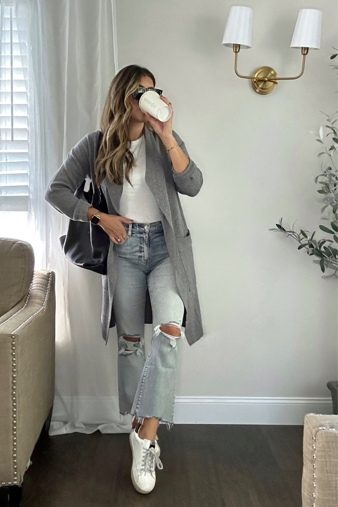 Casual fall sneaker cardigan outfit. Gray cardigan. Wearing a small. Linked below to cardigan + accessories and beauty. 🫶🏼

Use code LAUREN202 for 20% off bag. 

Follow for more! Xx

#LTKstyletip #LTKtravel #LTKSeasonal