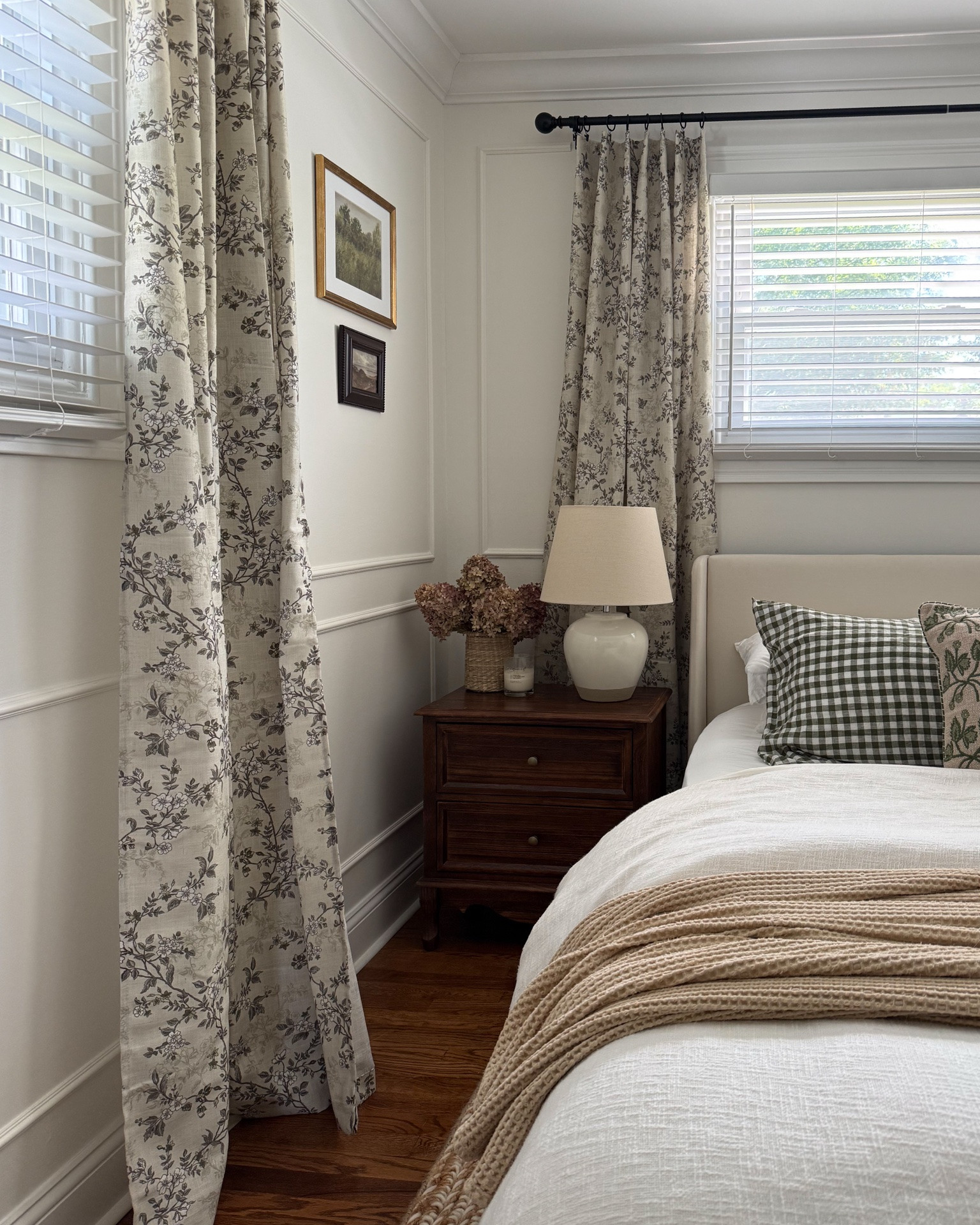 New curtains loading!!! Adding some English country charm to our builder grade bedroom 🪴 Floral curtains, patterned curtains, gingham pillow, walnut nightstand, English countryside inspired

#LTKHome
