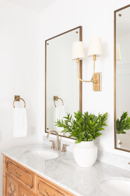 My bathroom’s two arm brass sconce from Visual Comfort is discounted currently! Shop it now! 

#LTKHome #LTKStyleTip #LTKSaleAlert