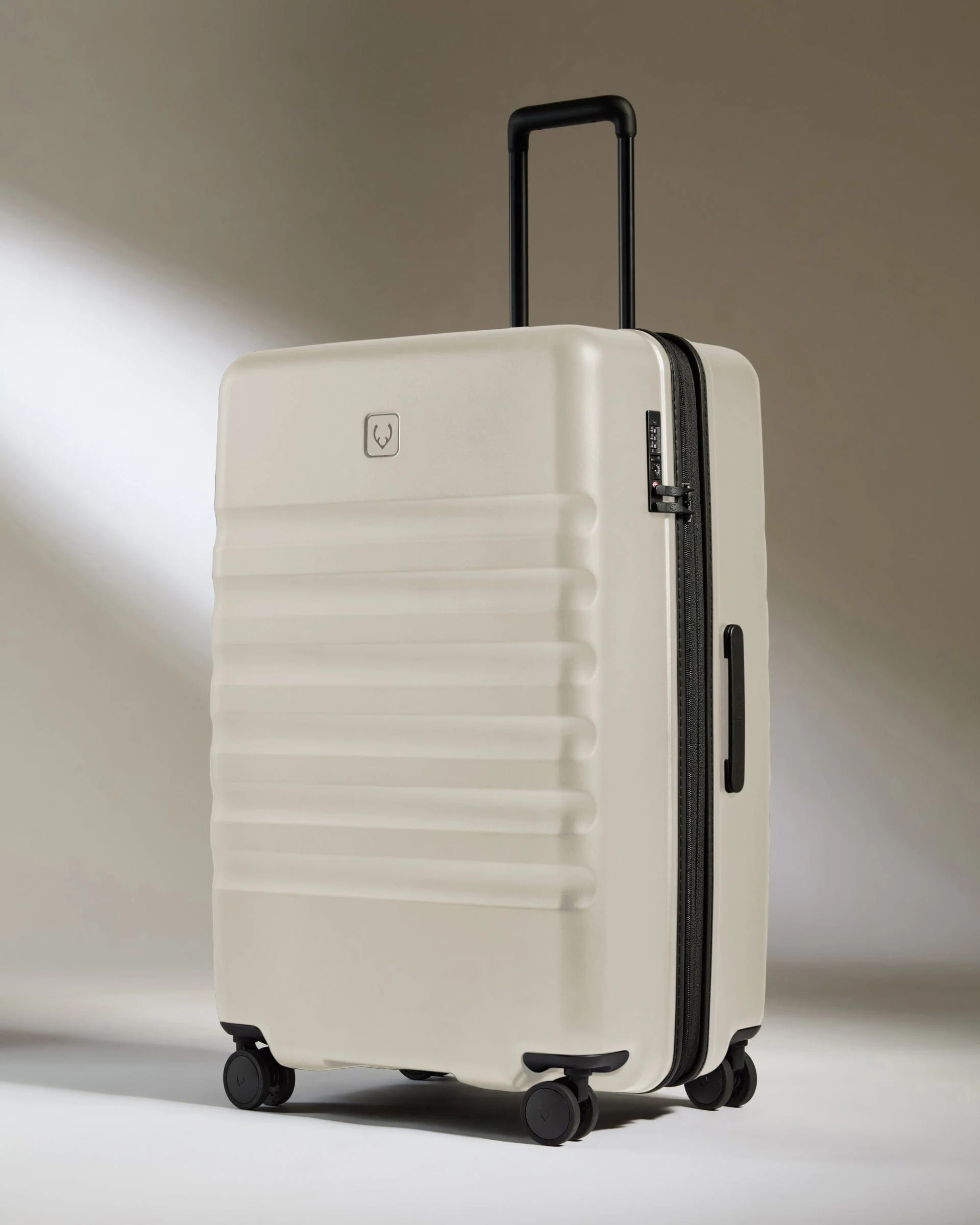 Large Suitcase in Taupe - Icon Stripe | Lightweight & Hard Shell Suitcase | Antler UK