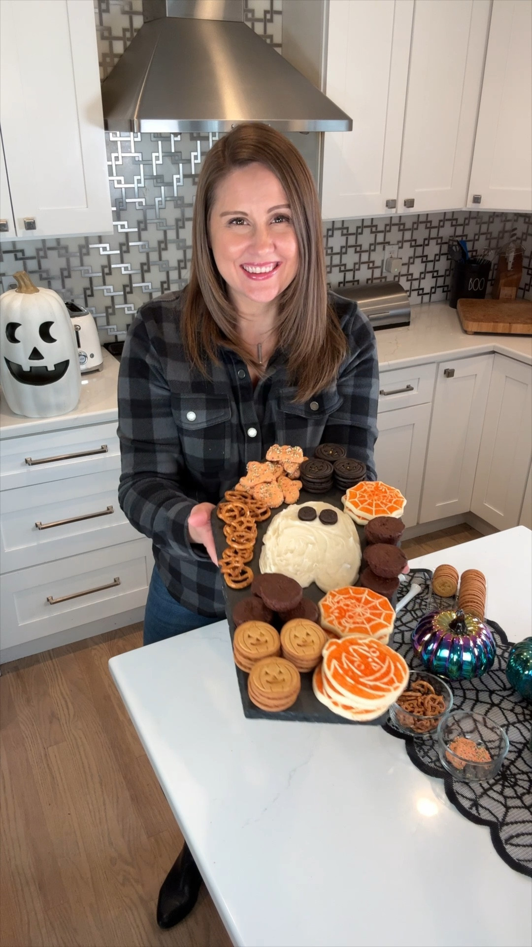 Get into the Halloween spirit with a CharBOOterie sweets board! 🕸️👻 Start by using white frosting to create a ghost shape on your board, then fill it with all your favorite spooky treats. Perfect for parties or a fun family night! 🎃🍬 #HalloweenTreats #CharBOOterie #SpookySnacks #DIYHalloween #SpookySeason 

#LTKFamily #LTKHome #LTKSeasonal