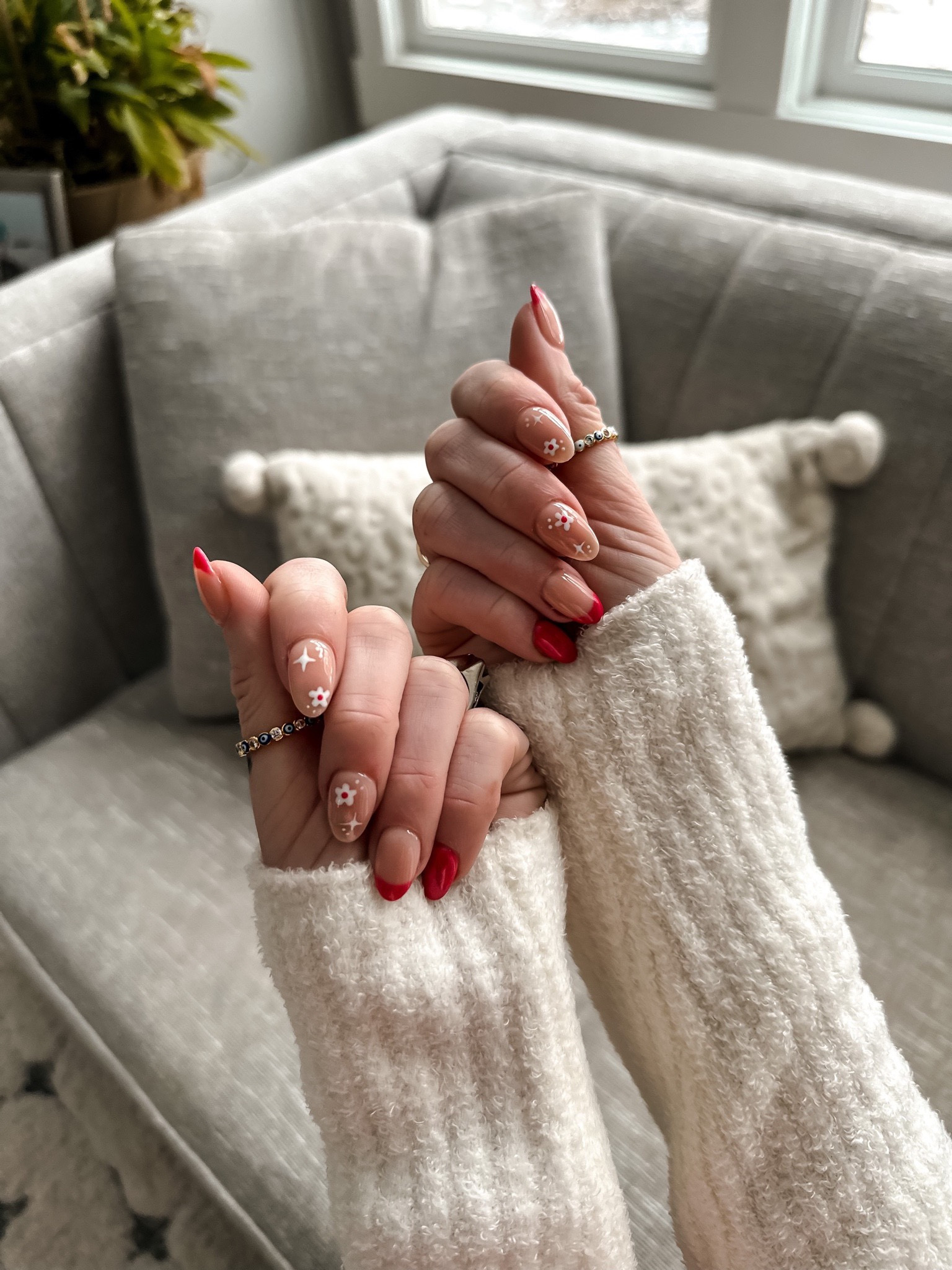 Festive pink nails valentines girly vibes and evil eye thumb rings from Amazon 