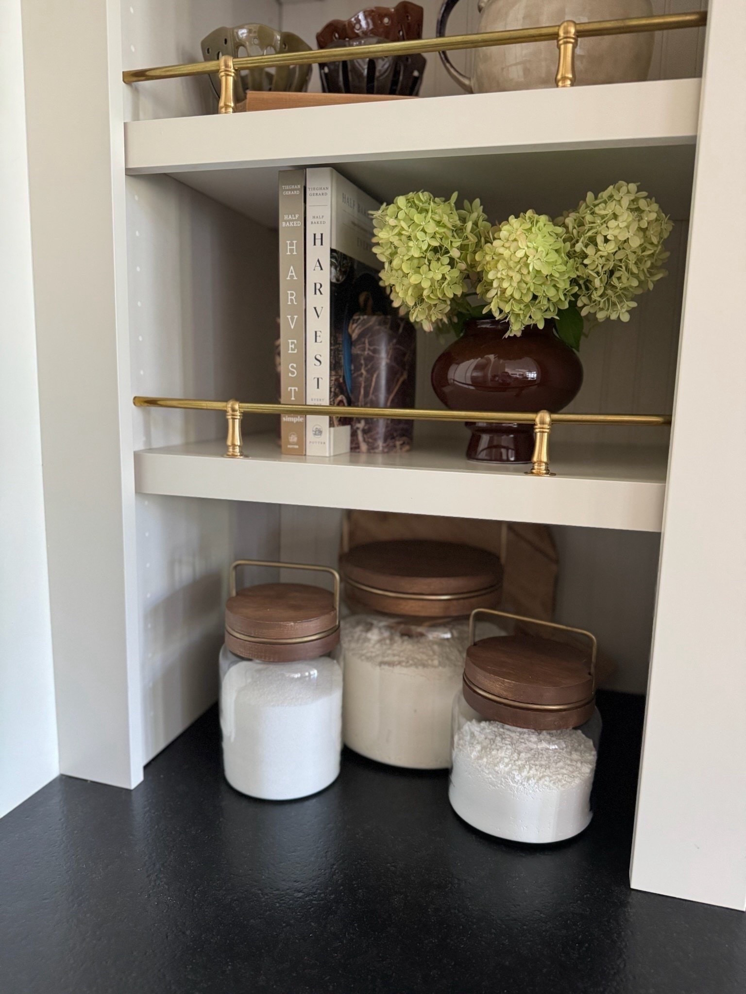 These wood and antique brass canisters are the perfect cozy addition to any kitchen! Functional of course, and so beautiful.

#LTKHome
