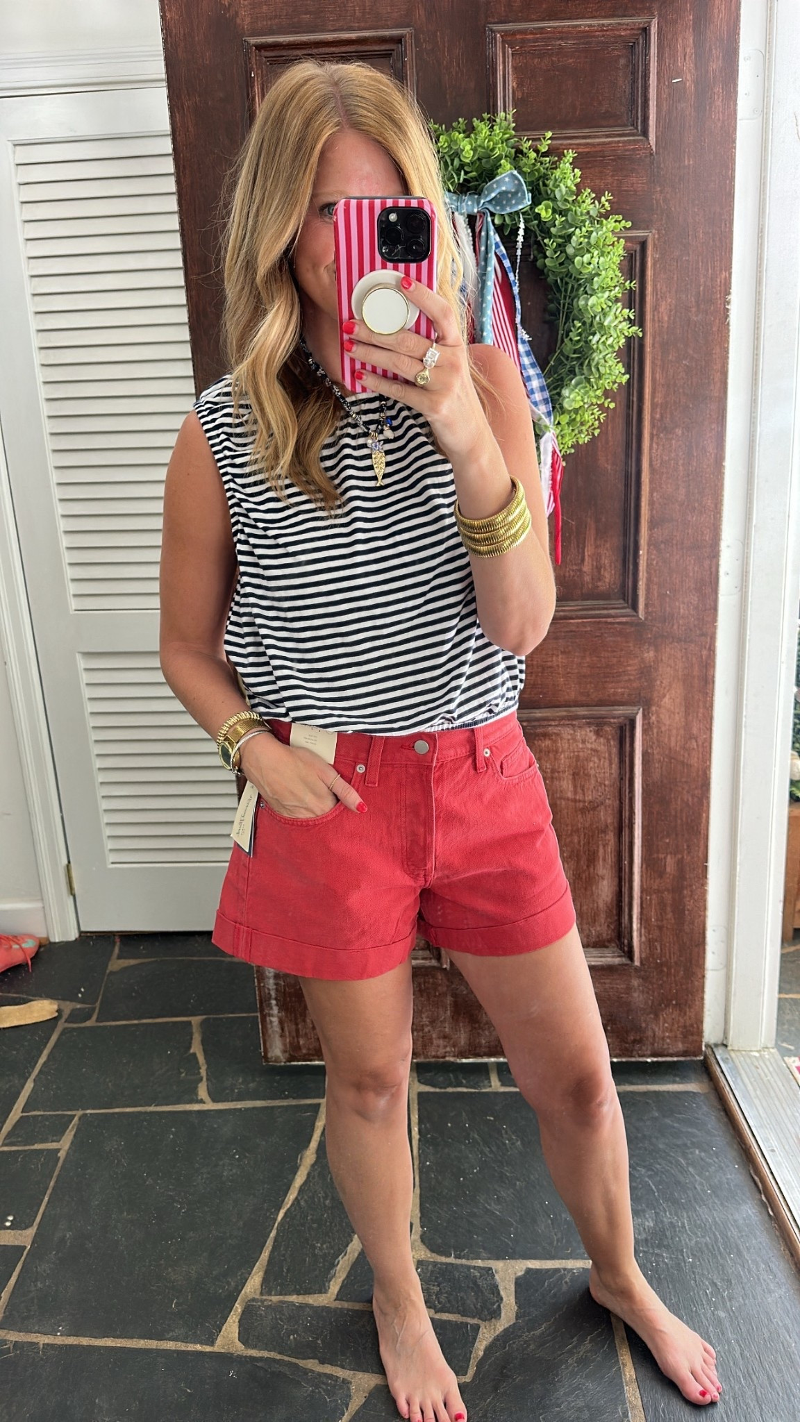 The key to the 90s baggy shorts is sizing up one! I’m in an 8. And this bubble hem tank is so cute! Size M