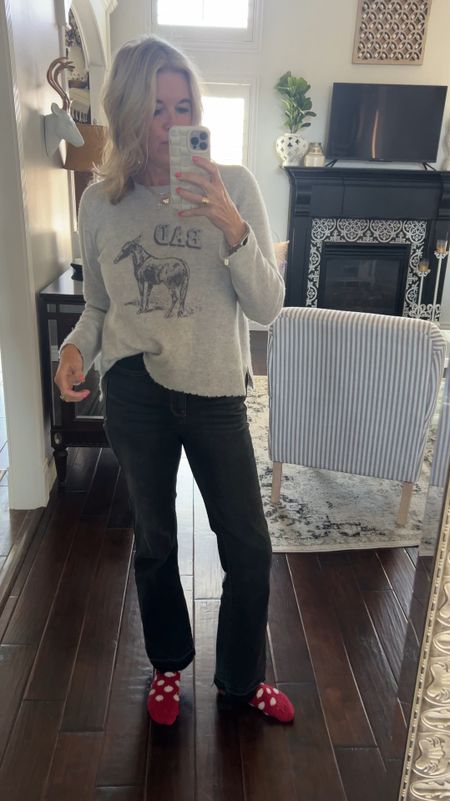 Outfit of the day… stay at home…

Black frayed  hem Judy blue jeans/denim
Comfortable, tts , works for #tallgirls  
$79 so good great soft denim 

Cashmere cotes of London Bad A** graphic sweater tts and oh so soft!

Save 10% off with code DARCY10

Red polka dot old fuzzy socks !

Gold Amazon designer inspired earrings

#LTKVideo #LTKstyletip