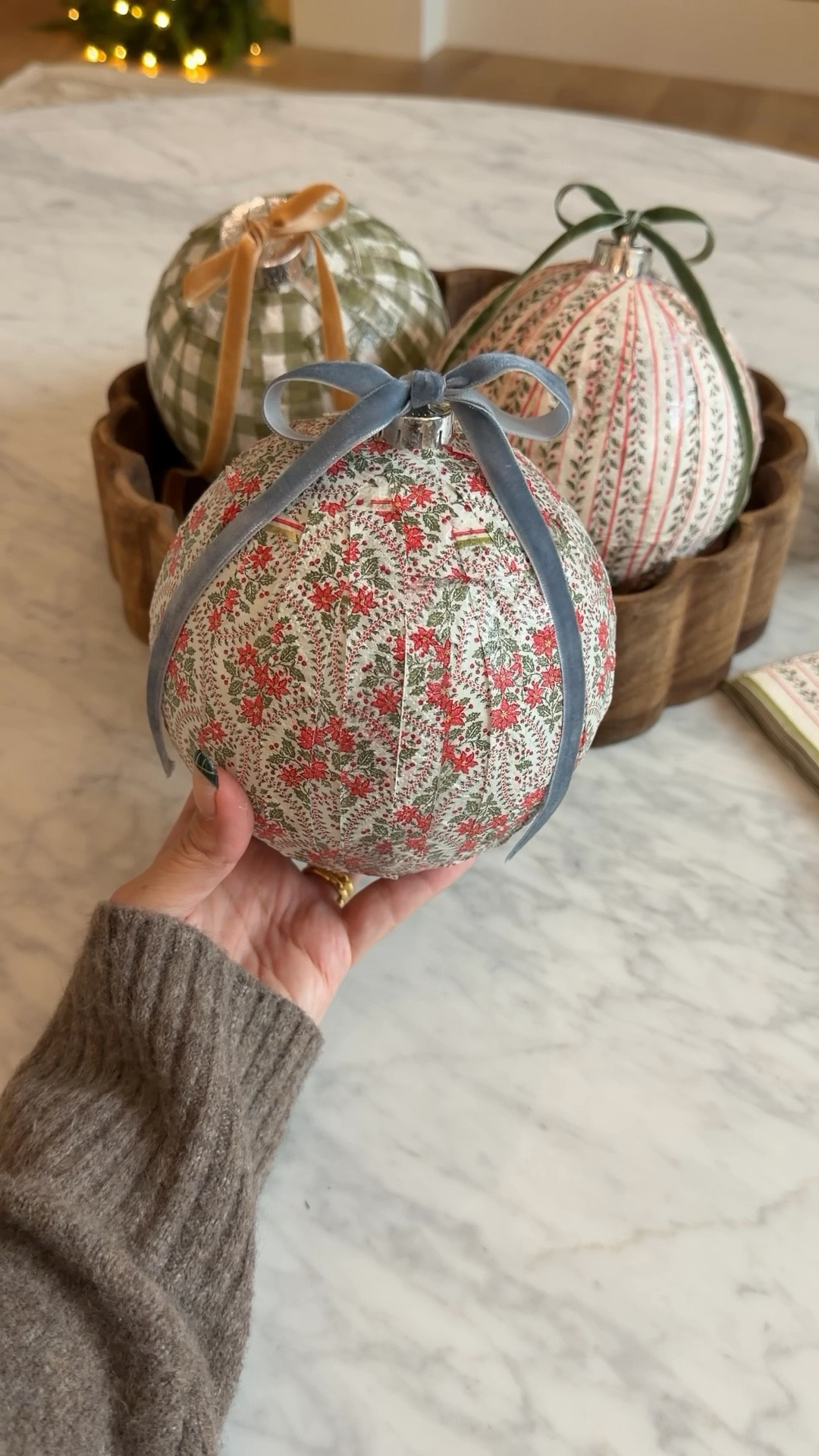 These paper maché ornaments feel like they belong in a cottage somewhere in the English countryside. Gingham, holly, poinsettias….all the cozy cottage-core details I’m reaching for this Christmas. ✨🎄🪵 
Napkins from @homegoods

#LTKHoliday #LTKSeasonal #LTKHome