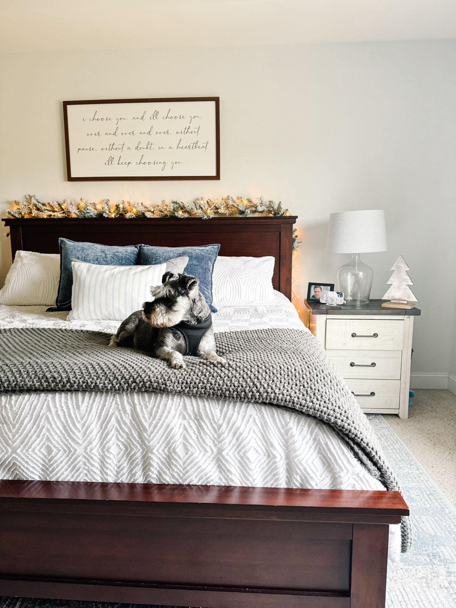 Hurry and grab this $15 flocked garland. For the price, the quality and look is incredible. I added a $3 string of lights for an extra cozy look. This is the perfect addition to the top of a headboard to add some Christmas cheer to a bedroom.

#LTKSeasonal #LTKHoliday #LTKhome