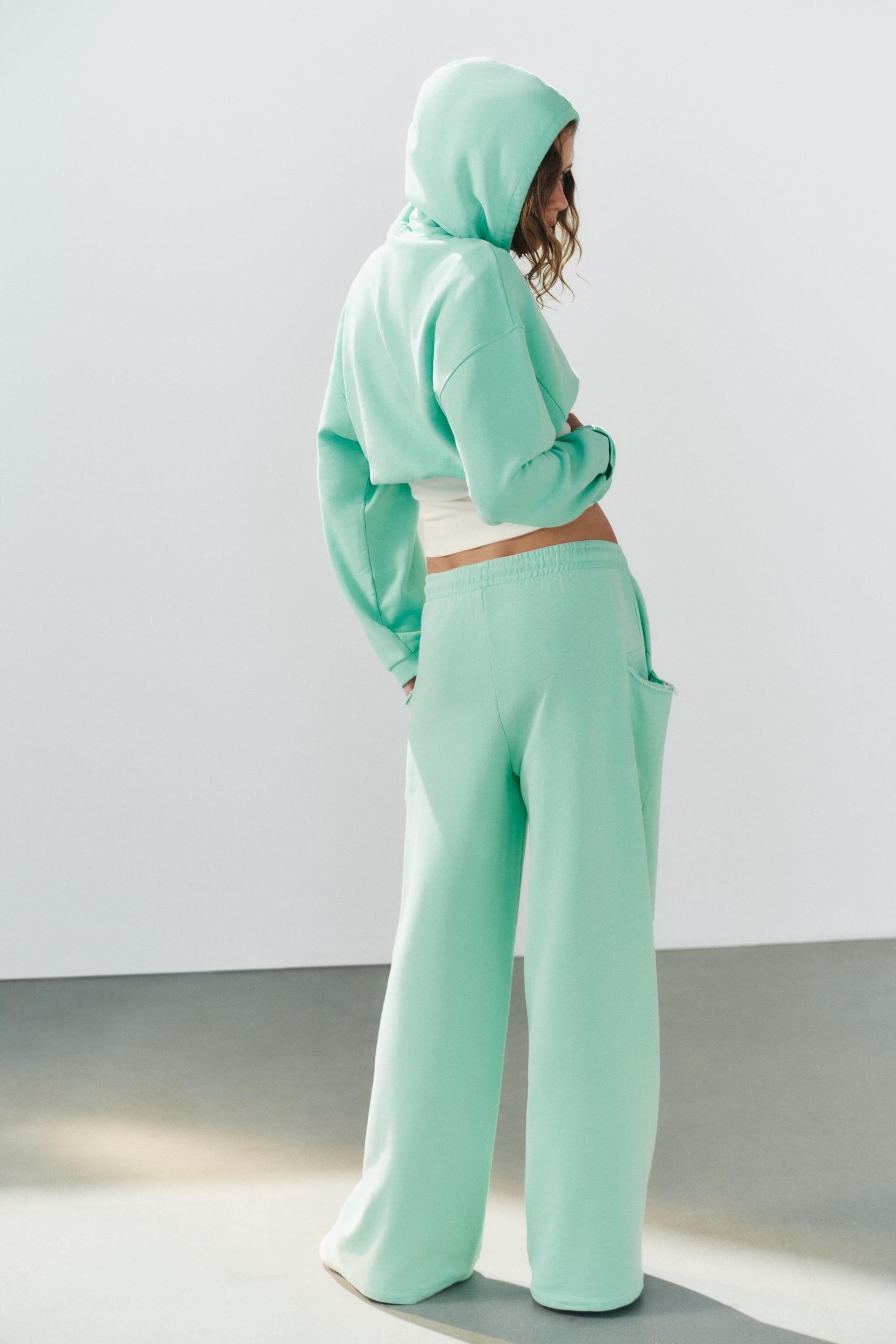 Trousers crafted from a cotton-blend fabric. Mid-rise with an elasticized, tie-adjustable waist. ... | Zara US