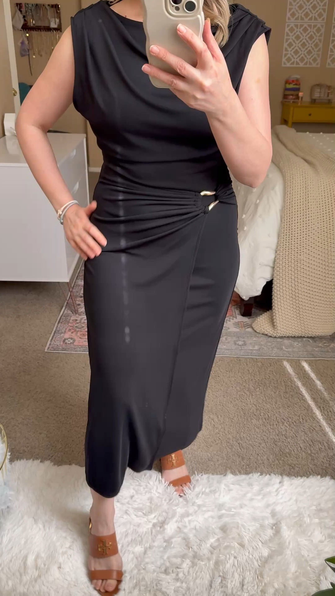 This cute wrap black dress from Loft is very classy and elegant. The ruching makes it very flattering, and the boatneck and cap sleeves add a touch of style. It’s on sale now. #LTKOver40 #LTKPetite

#LTKWorkwear #LTKWedding #LTKSaleAlert