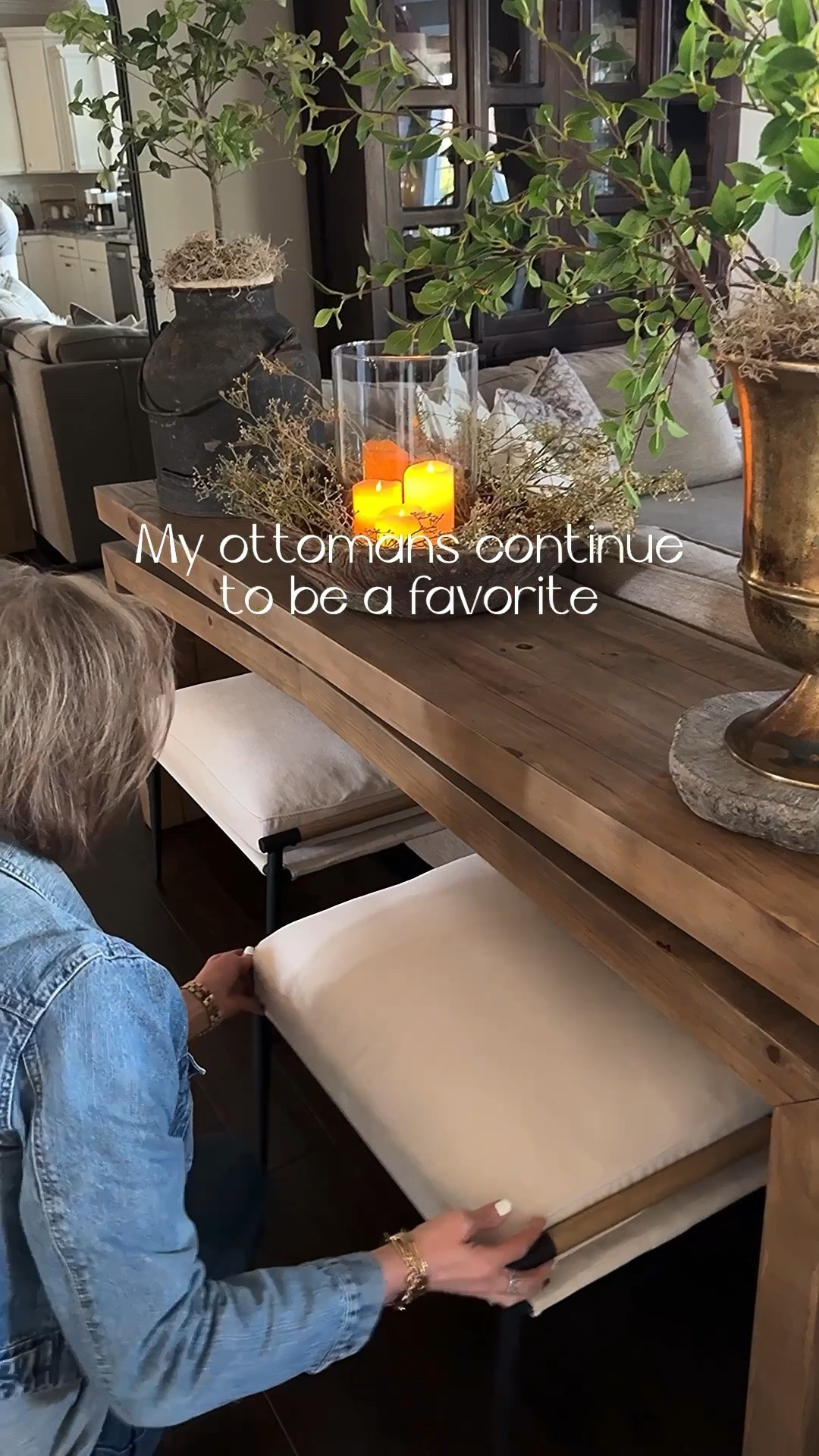 Rustic Modern Console Table & Ottomans!!
My ottomans continue to be my best seller as well as my beautiful console table. My table is the color Sierra Rustic Natural and it’s 78.75” wide. 

Console table, ottomans, vintage wood bowl, gold urn, stone pedestal, greenery, rice stems, flameless candles, vintage pots, 
Floor lamp with woven shade

#LTKHome #LTKSeasonal #LTKstorytime