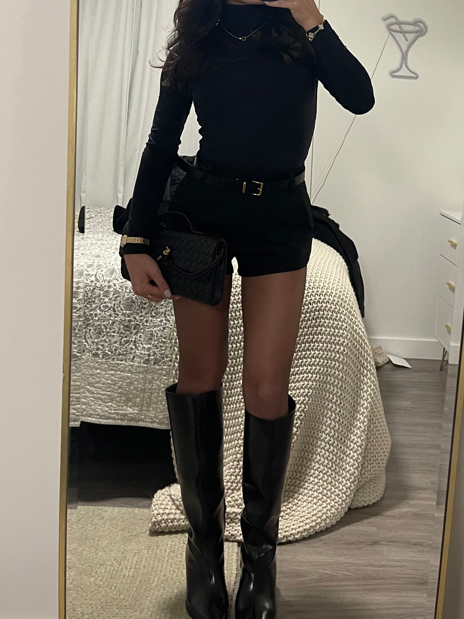 Micro shorts are IN !!! 

Bodysuit - Aritzia 
Belt - Aritzia 
Shorts - artless forever 
Tights - target
Boots - Zara 
