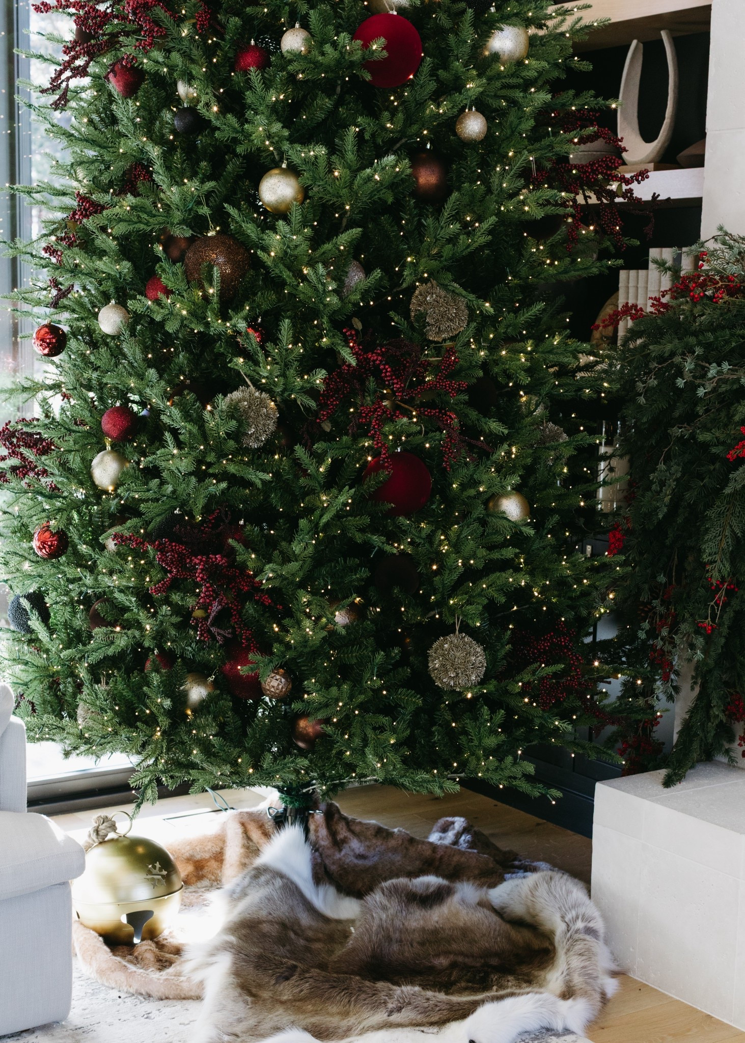 Christmas tree details. I used a mix of old and new ornaments. The burgundy tree picks were the perfect addition. It was tough to find true burgundy decor!

#LTKHome #LTKHoliday #LTKSeasonal