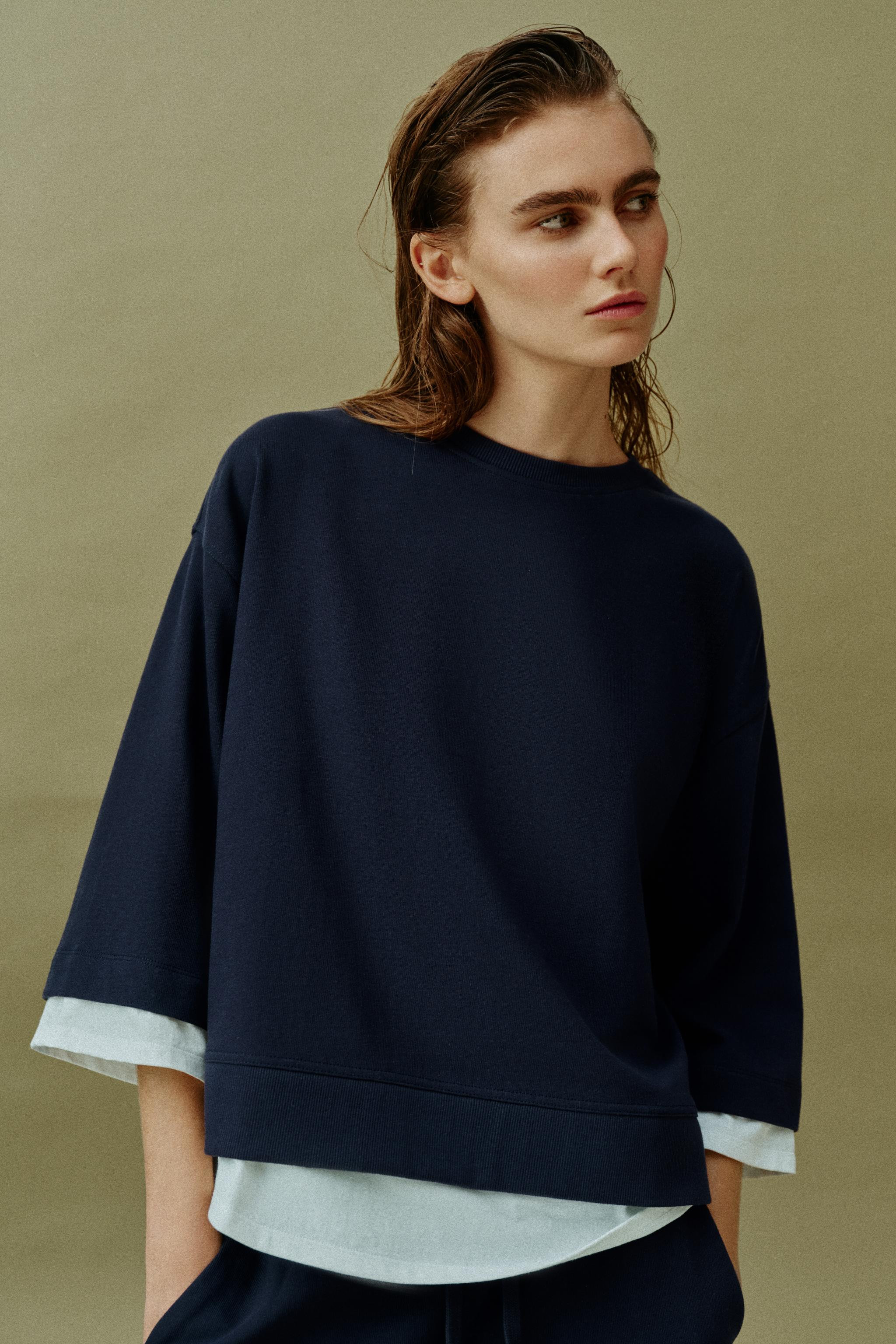 Sweatshirt with main fabric crafted from cotton yarn. Featuring a round neck and long sleeves. As... | Zara UK