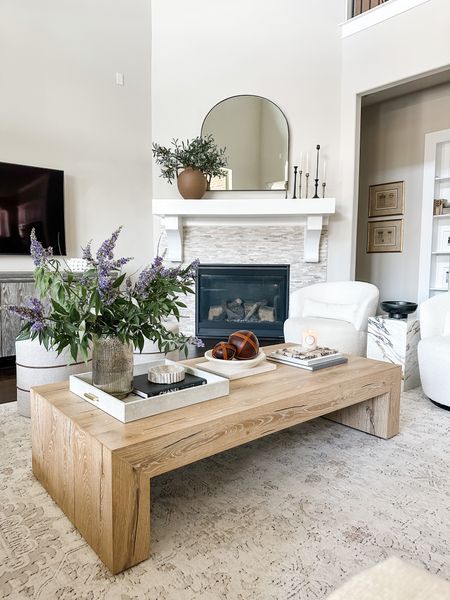 My latest living room view. My fireplace mantel with my new McGee and co vase and olive branches! Check out  my marble plinth table and my coffee table too. 

#LTKhome #LTKSeasonal #LTKstyletip