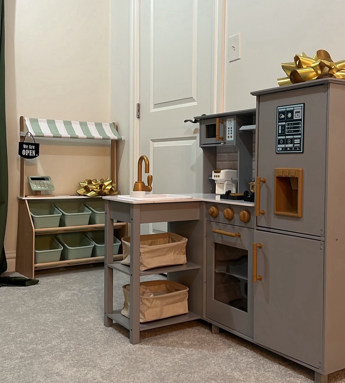 Pretend play favorites at home! His play kitchen is completely interactive with a faucet that activates to make water sounds, a stove top that turns on, an ice maker that produces ice, several matching utensils and foods and a coffee maker with coffee pods. The market is also a favorite around here! We ordered separate food and baskets for it  

#LTKhome #LTKkids #LTKfindsunder100