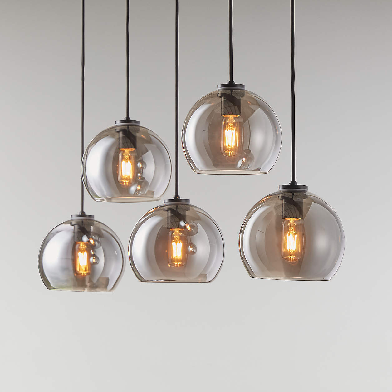 Arren Black Linear 5-Light Pendant with Silver Round Shades | Crate and Barrel | Crate & Barrel