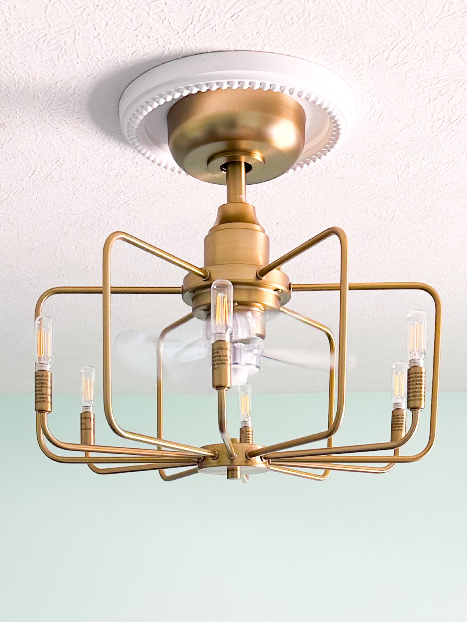 This fandelier is quite literally the prettiest addition we made to the bedroom.  The acrylic blades make it nearly disappear and the air flow is excellent.  I love that this ceiling light / ceiling fan combo comes in multiple color options as well. #lights #ceilingfan 

#LTKGiftGuide #LTKhome #LTKFind