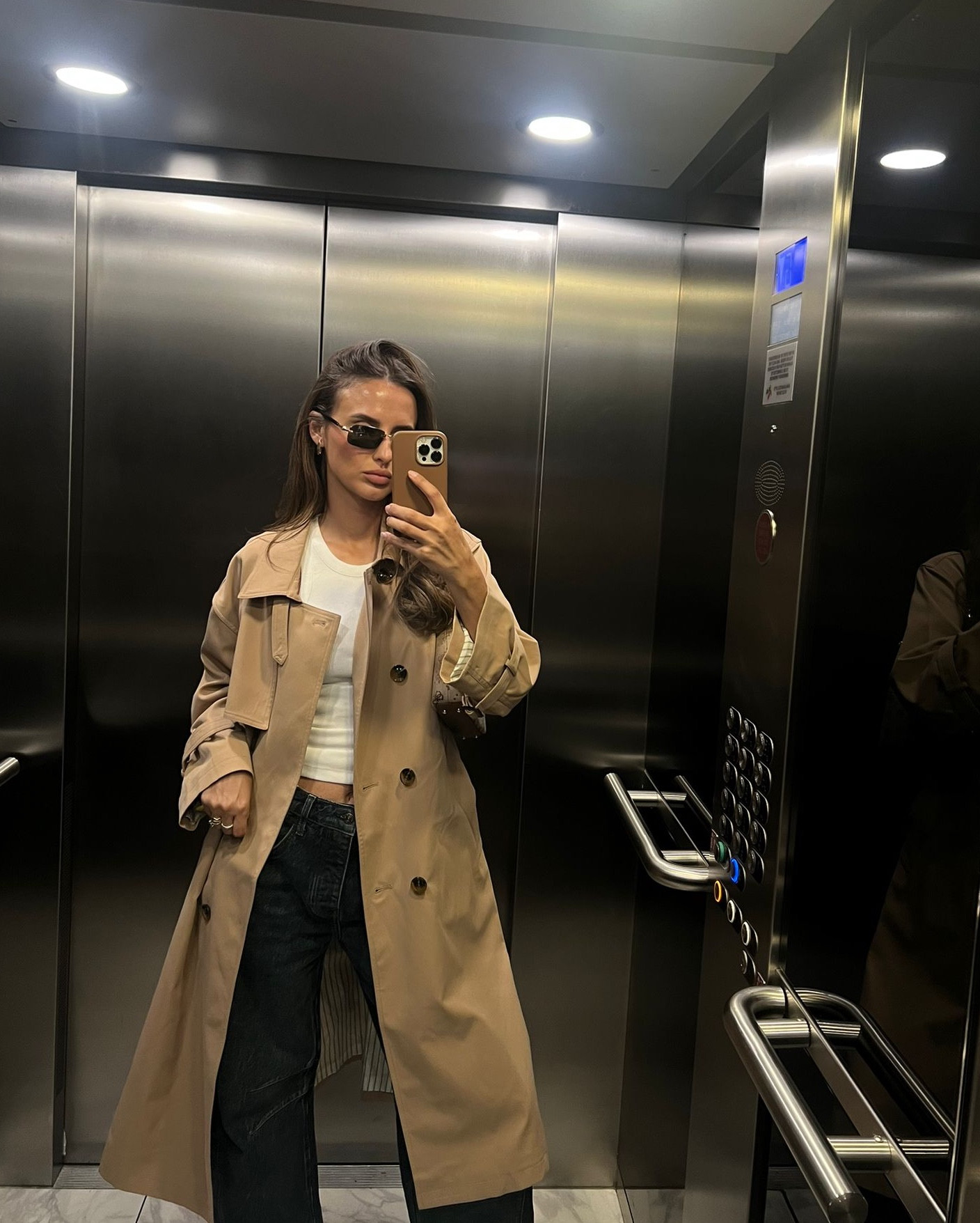 Guess Neda 4G shoulder bag, low rise black Levi’s, Jovonna trench coat, white racer vest 🤍

#LTKeurope #LTKuk #LTKsummer