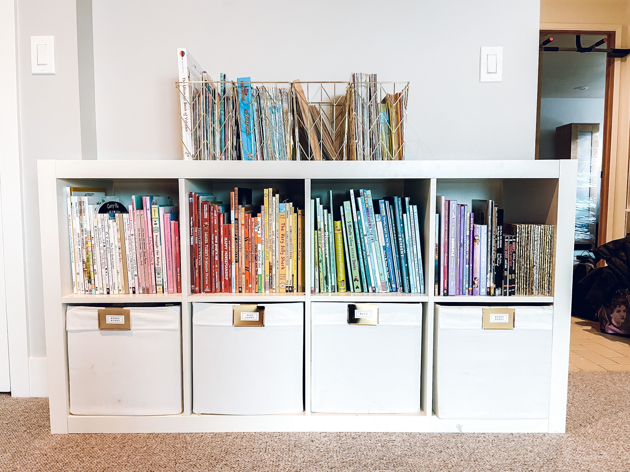Book + toy organization. Brightroom cube organizer and fabric bin. The Container Store bin clips✨

#LTKhome #LTKfamily #LTKkids