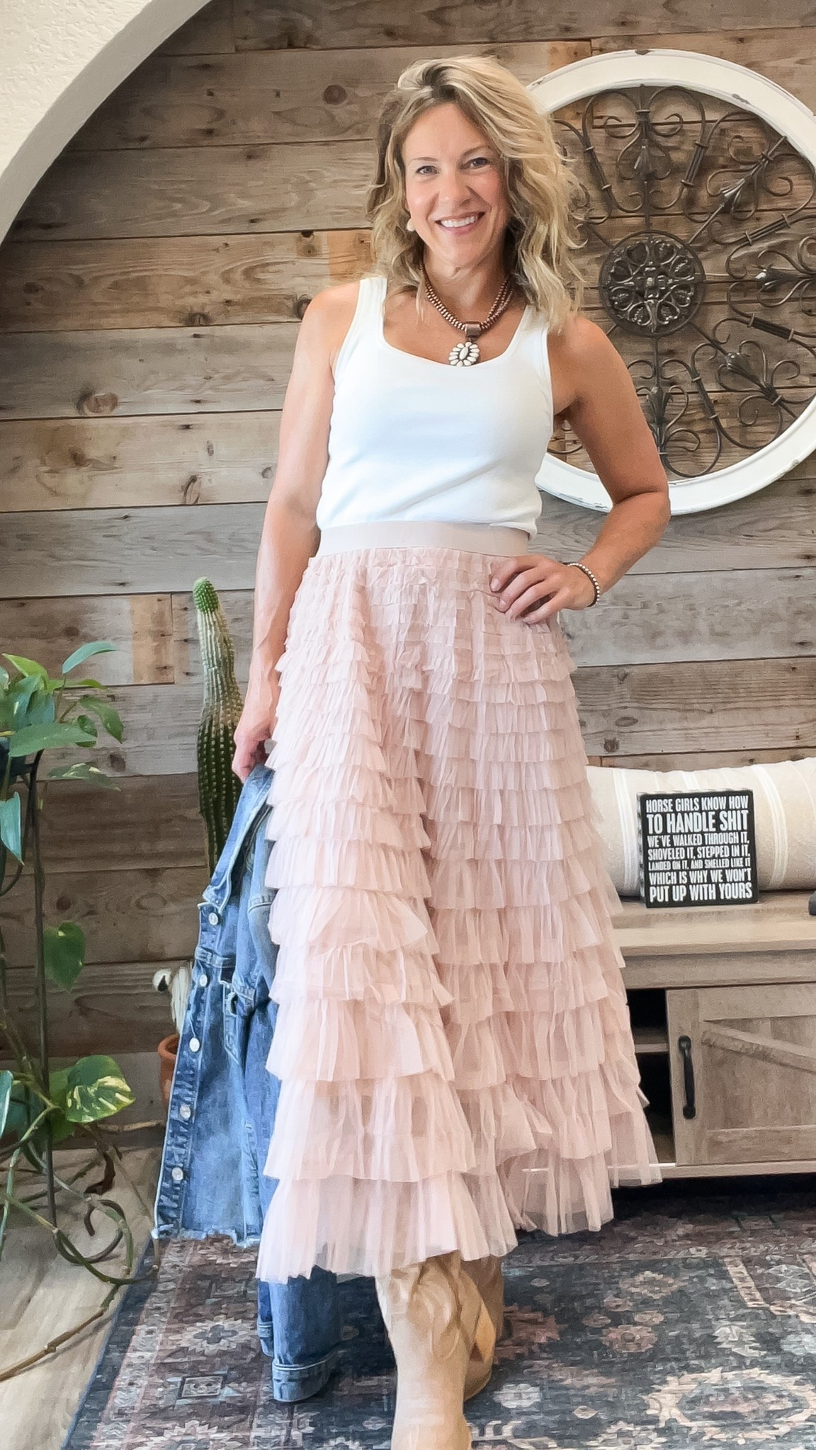 The skirt was begging me to come take a look because it would not stay out of my Amazon feed. Comes in so many colors, it is pretty and very forgiving. It’s reading pink in this photo, but I actually got more of a beige tan color. Can hardly see my knee-high boots, but they are fabulous. 10/10 