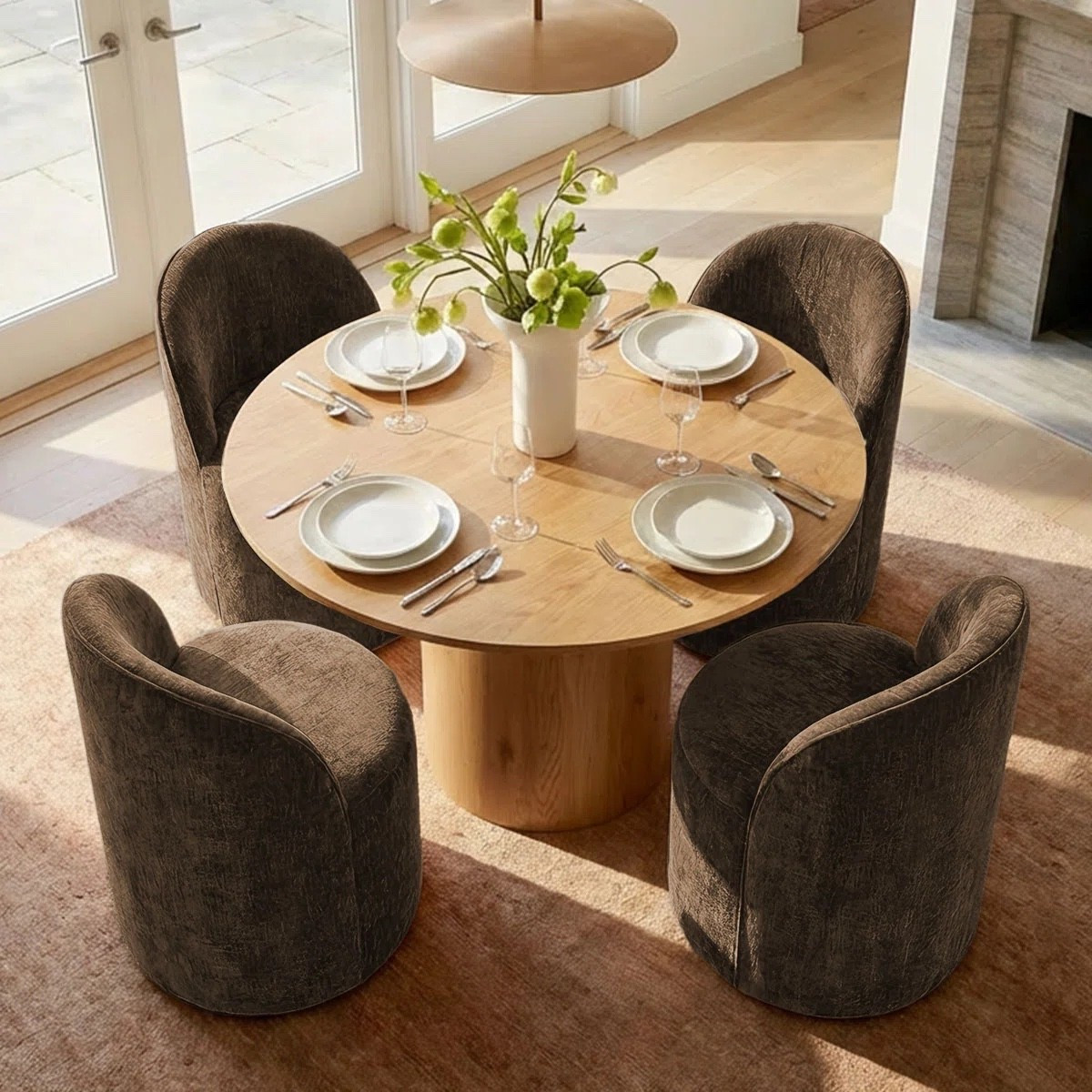 Designed with comfortable upholstered fabric chairs and a refined round table, this dining set blends everyday functionality with an effortlessly sophisticated aesthetic. ON SALE and under $1,100. The dining table is available in both light tan and black finishes, while the plush upholstered chairs come in multiple color options.

Keywords:

* round dining table set
* upholstered dining chairs
* 4 person dining set
* modern dining furniture
* kitchen dining set
* breakfast nook furniture
* contemporary dining set
* dining room furniture
* organic modern decor
* warm neutral interiors
* designer inspired dining room
* cozy dining space
* curated home aesthetic
* modern farmhouse dining
* boutique café aesthetic
* elevated everyday living

#LTKSeasonal #LTKHome #LTKSaleAlert