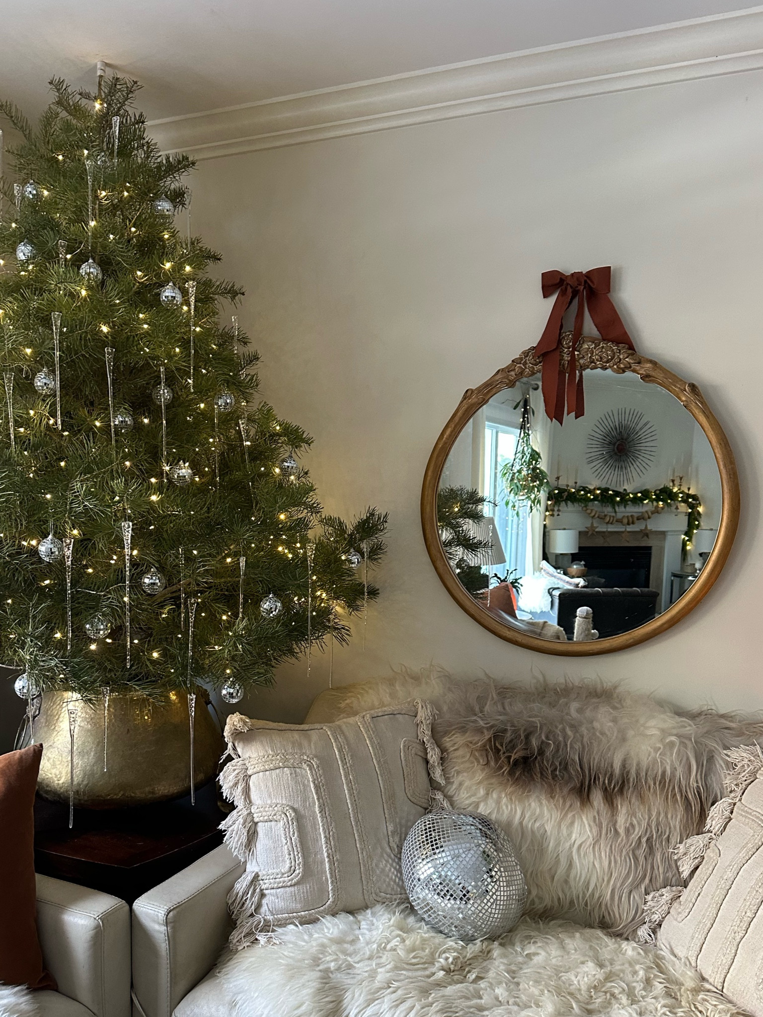 I bought a new antiqued mirror for above the sofa and added a bow! Love the look so much #livingroomdecor

#LTKStyleTip #LTKHome #LTKSaleAlert