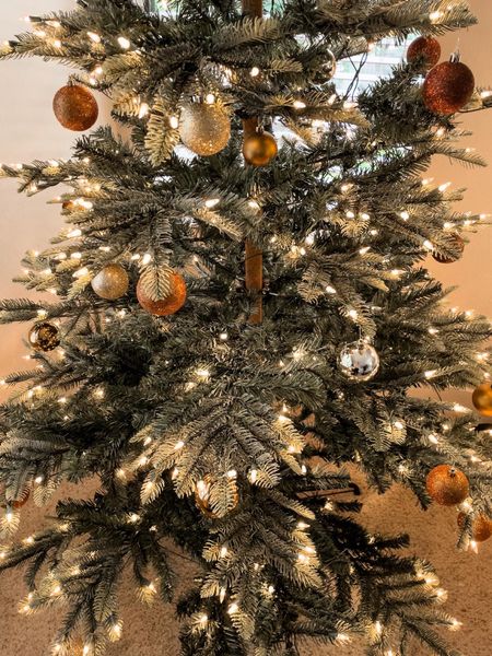 FAUX Christmas TREE! Brown copper gold ornaments! 

Christmas, holiday style, faux trees, pre lit natural tree, home decor #HollyJoAnneW

#LTKsalealert #LTKhome #LTKHoliday