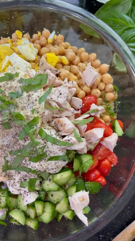 🍃BASIL RANCH PASTA SALAD🍃 is what you need for your next bbq! It screams spring and summer, plus it gives me a chance to use all the fresh basil from the garden  

INGREDIENTS 
1 pound @publix radiatori pasta
1 can @goyafoods (15.5 oz) chick peas, drained 
1.5 cups cherry tomatoes, halved 
4 mini cucumbers, halved 
3 tbsps purple onions, diced 
3 @mezzetta pepperoncinis, sliced 
3 hard boiled eggs, chopped 
1.5 cup chicken, diced 
1/2 cup @dukes_mayonnaise 
1/4 cup @primalkitchenfoods ranch dressing 
6 basil leaves, sliced (4 to mix, 2 for garnish) 
Salt, cracked pepper - to taste 

DIRECTIONS 
1. Cook pasta according to package  instructions. Once done, drain and rinse under cold water. 
2. Add pasta and remaining ingredients into a large bowl. Gently mix. 
3. Top with basil and cracked pepper before serving. 

#pasta #pastasalad #easyrecipes #bbq #partyfood #bbqfood #kitchen  #glassbowls #bowls 

#LTKfindsunder50 #LTKparties #LTKfindsunder100