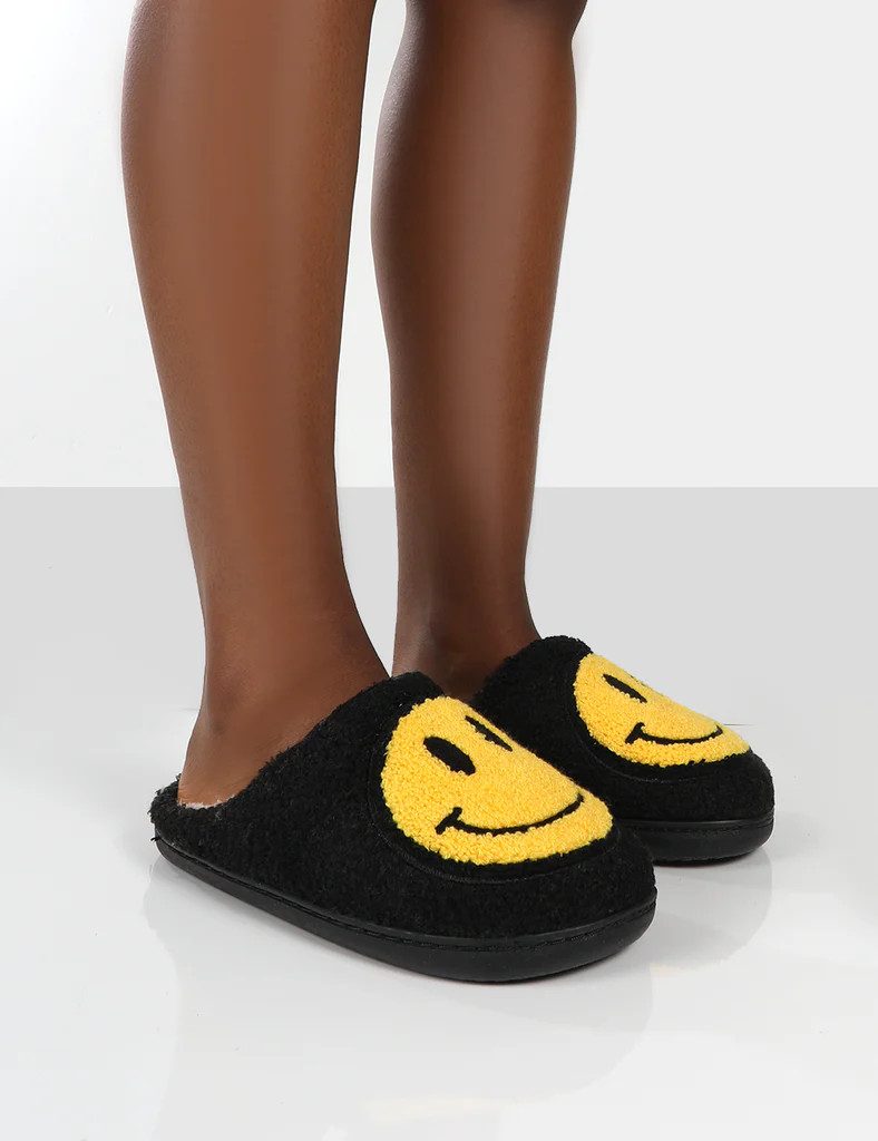 SMILE BLACK PRINTED SMILEY FACE SLIPPERS | Public Desire