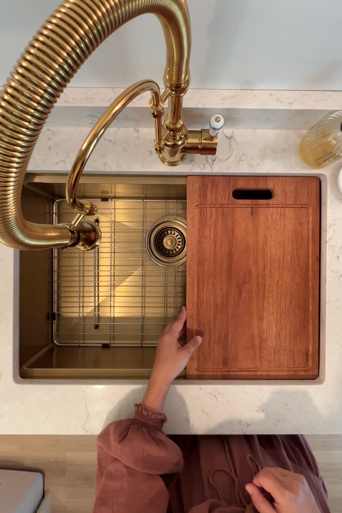 Best thing we added to our pantry? 

@ruvati's workstation sink! Look at the functionality it offers! Major bonus points that it comes in a brass finish. ✨ 

I use this sink way more than I thought I would: to contain post-dinner messes when company is over…to rinse away the dirt from daily garden harvests…to pre-soak items before throwing them in the laundry…to clean toddler hands after an attack of the markers. Now that I think about it — I bet I could bathe said toddlers here too! 👧🏼👧🏼 

Would you trade your current sink for this work(station) of art? 🤩 



#LTKstyletip #LTKhome #LTKsalealert