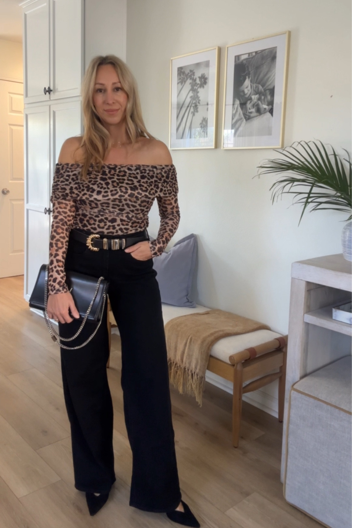 Winter date night style off the shoulder animal print top wide leg jeans and belt 

#LTKFindsUnder100 #LTKOver40 #LTKMidsize