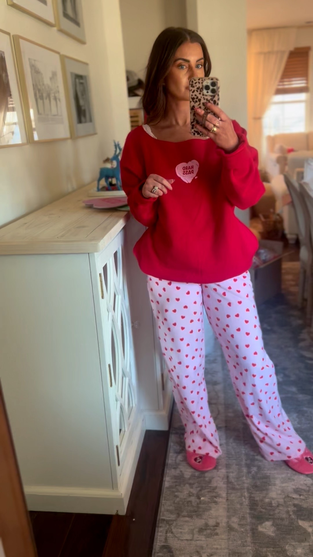 Red heart Valentine’s day sweatshirt-medium
Fleece pink pajama pants w/ red heart print-xs, small woudlve fit better
Pink candy heart slippers
