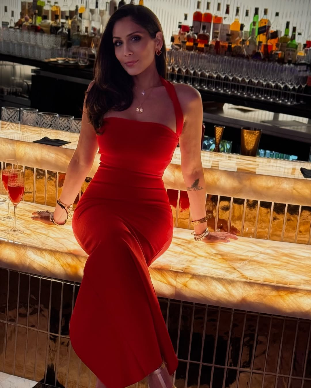 When in doubt, wear red. ❤️‍🔥🍸
This Bella Barnett dress is the moment. The halter fit is so flattering and the color is perfection for a night out. It hugs in all the right places! 

 #LTKgrwm #LTKActive #LTKBeauty
