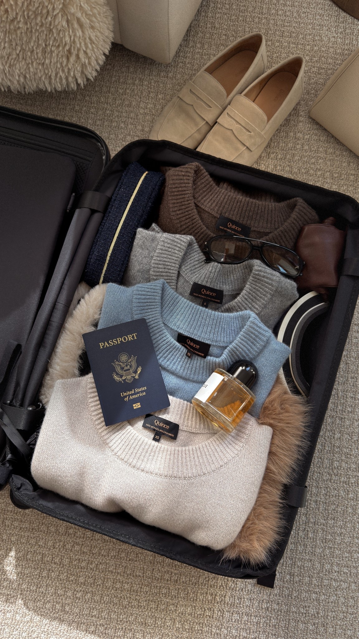 Packing for Chamonix and bringing my most worn cashmere crew necks + new luggage ⛷️✨ This carry-on fits so much but still feels incredibly light. @Quince 
#quincepartmer 