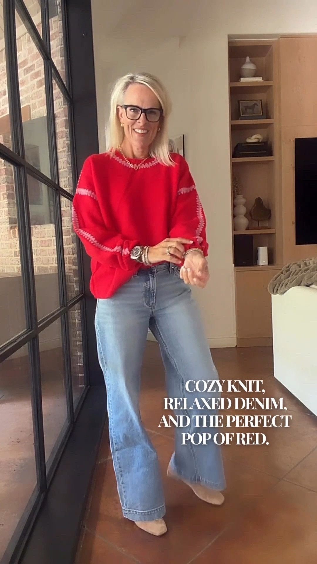 A cozy knit and relaxed denim are such an easy combination for fall. I love the bright red sweater with its pretty pink detailing, it adds just enough color to make a simple jeans outfit feel special while still being easy to wear.

#LTKootd #LTKOver40