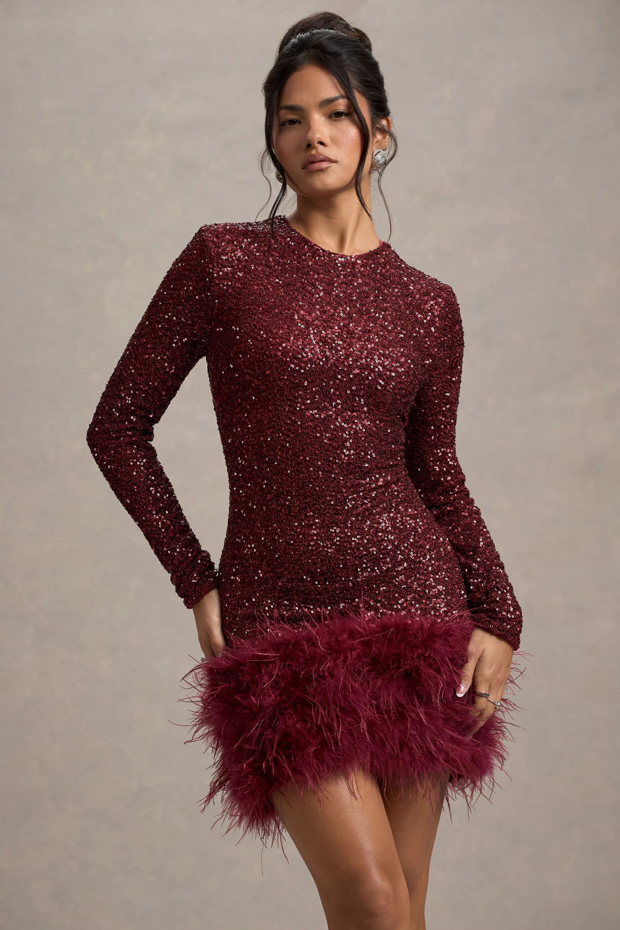 Claudia | Berry Sequin High Neck Feather Hem Mini Dress With Long Sleeves | Club L London