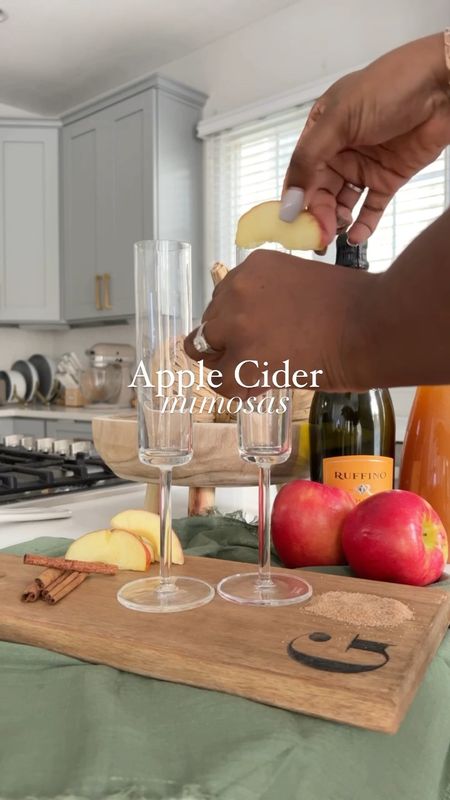 Rub an apple around the rim so the juice will make the cinnamon stick to it.
Dip the rim in cinnamon and sugar.
Fill the glass with as little or as much cider as you like.
Top off with your favorite champagne!
Enjoy!

Apple cider mimosa, fall, cocktail, champagne glasses, thanksgiving, cocktail

#LTKSeasonal #LTKfamily #LTKhome