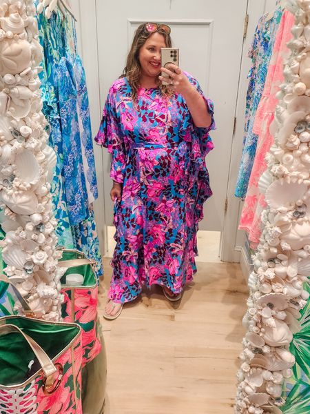 I was asked to put up a specific review of just this caftan from the sale 
Originally $500 I snagged this in the sale and was NOT expecting it to fit bc it is a size L/XL which TYPICALLY would mean it runs small. It does not! The slip under this is super stretchy AND comfortable! @lillypulitzer needs to make MORE of this style caftan ASAP ! 
It is very flowy. Very comfy. And I got a LOT of compliments on it in Atlanta this past weekend. It has a tie that goes through the middle and around to the outside of that makes sense… instead of the tie being all on the outside of the dress. I was not a huge fan of this print this past fan but I did get the midi dress to match my daughter anyway and it too was very stretchy. This caftan is their best  lately. I am tagging where I see it resale. Otherwise you would need to contact signature stores to see who still has one! #livinglargeinlilly #lillypulitzer #caftan #tryonnotes  

#LTKstyletip #LTKplussize #LTKmidsize